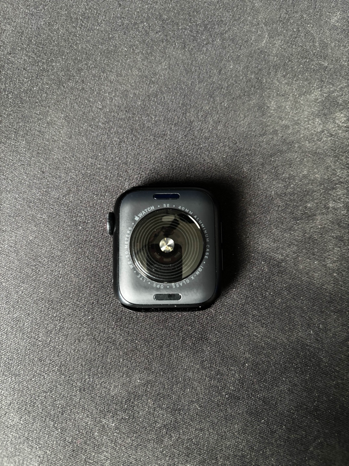 Back of an Apple Watch showing the engraved A-number