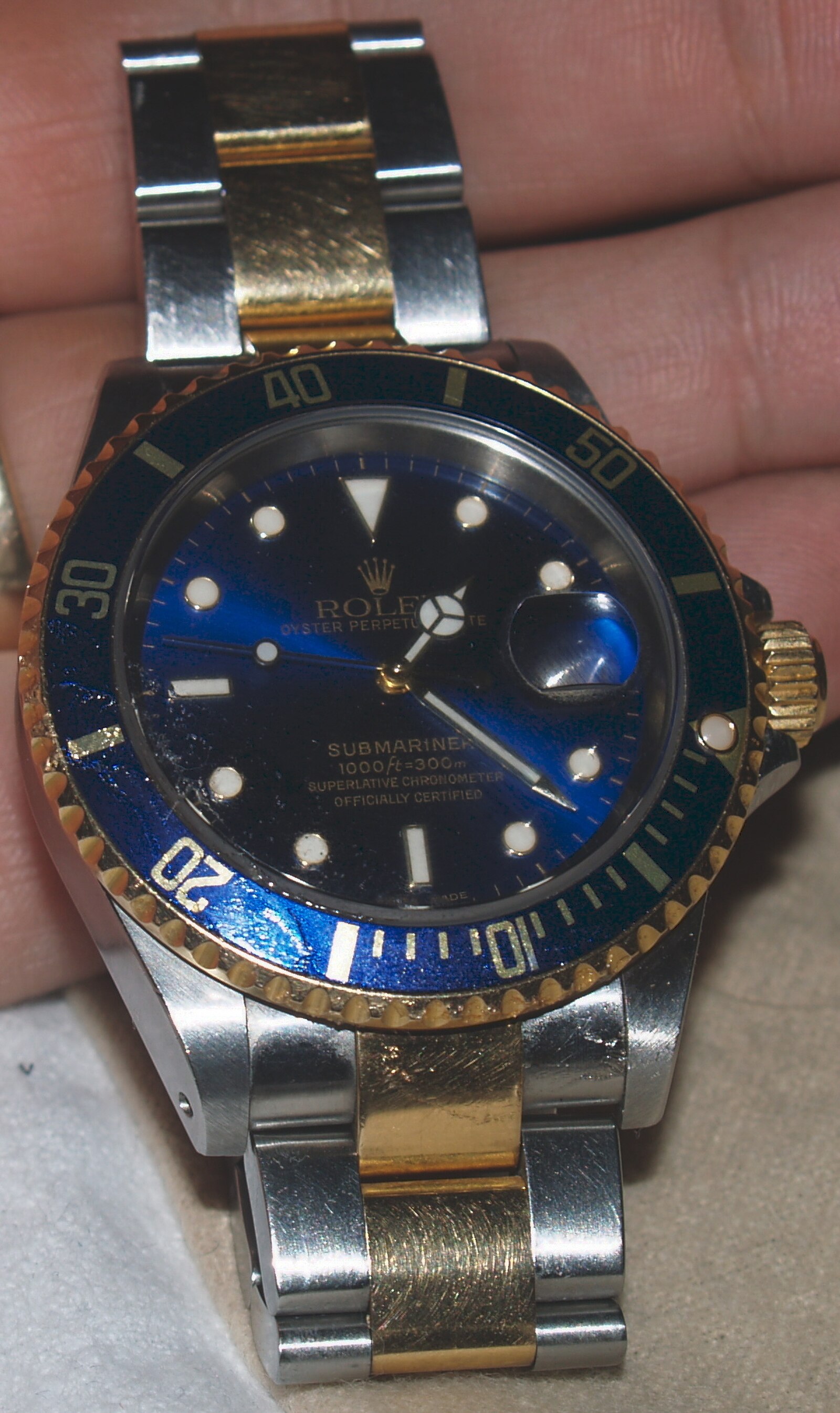 Close-up of a Rolex cyclops lens magnifying the date window