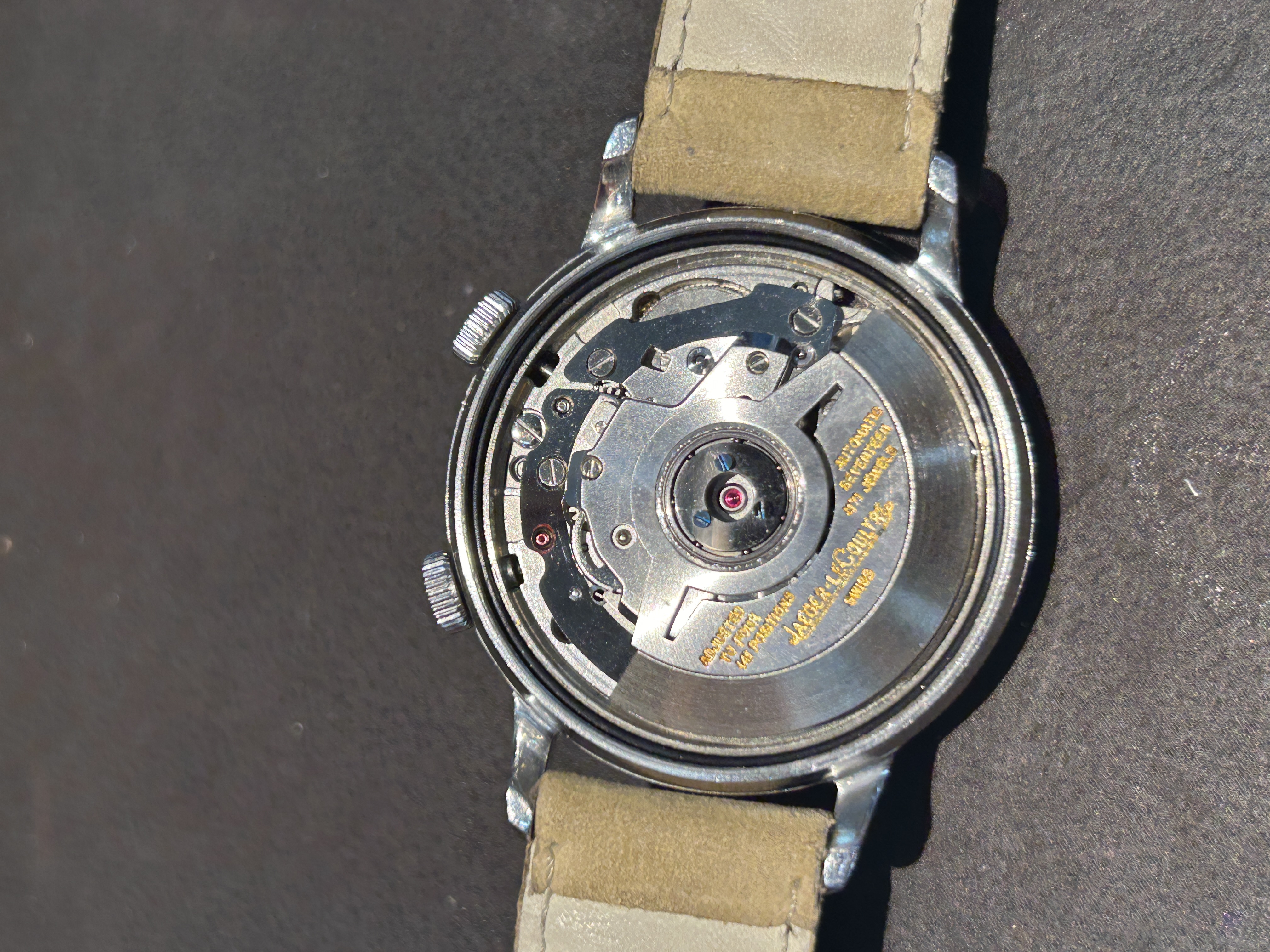 Jaeger-LeCoultre caliber K916 mechanical movement visible through an exhibition caseback